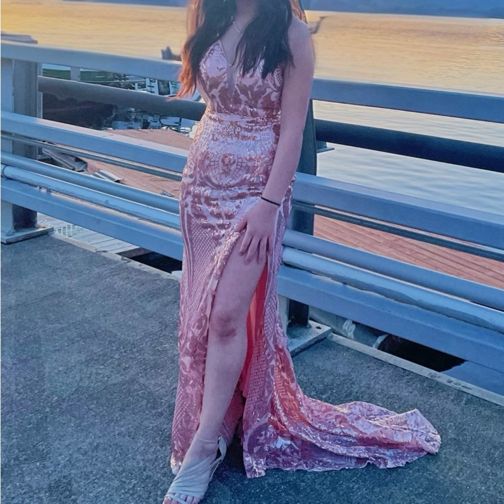 This prom dress is size 2, fit perfectly and I am 5”2